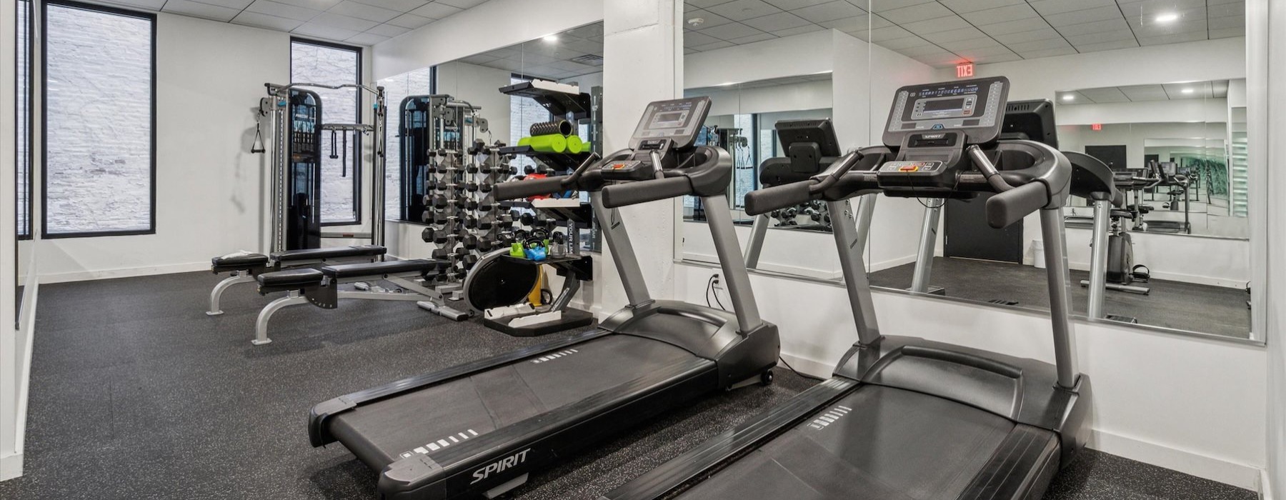 a gym with treadmills