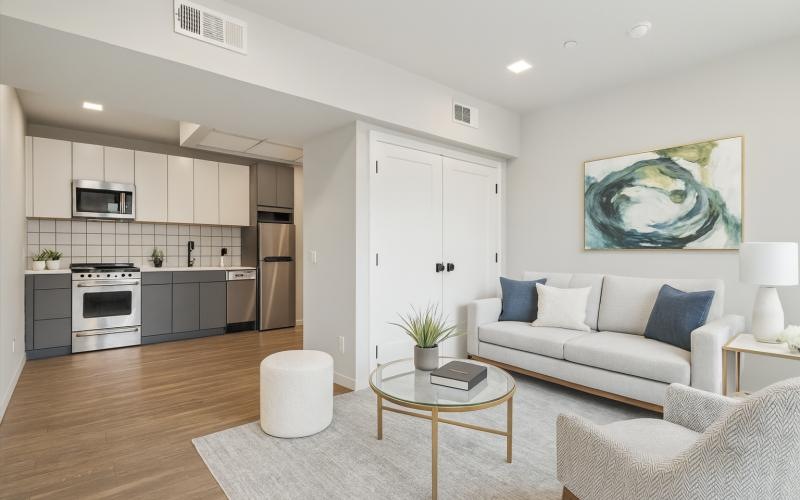 a living room with a couch and a table