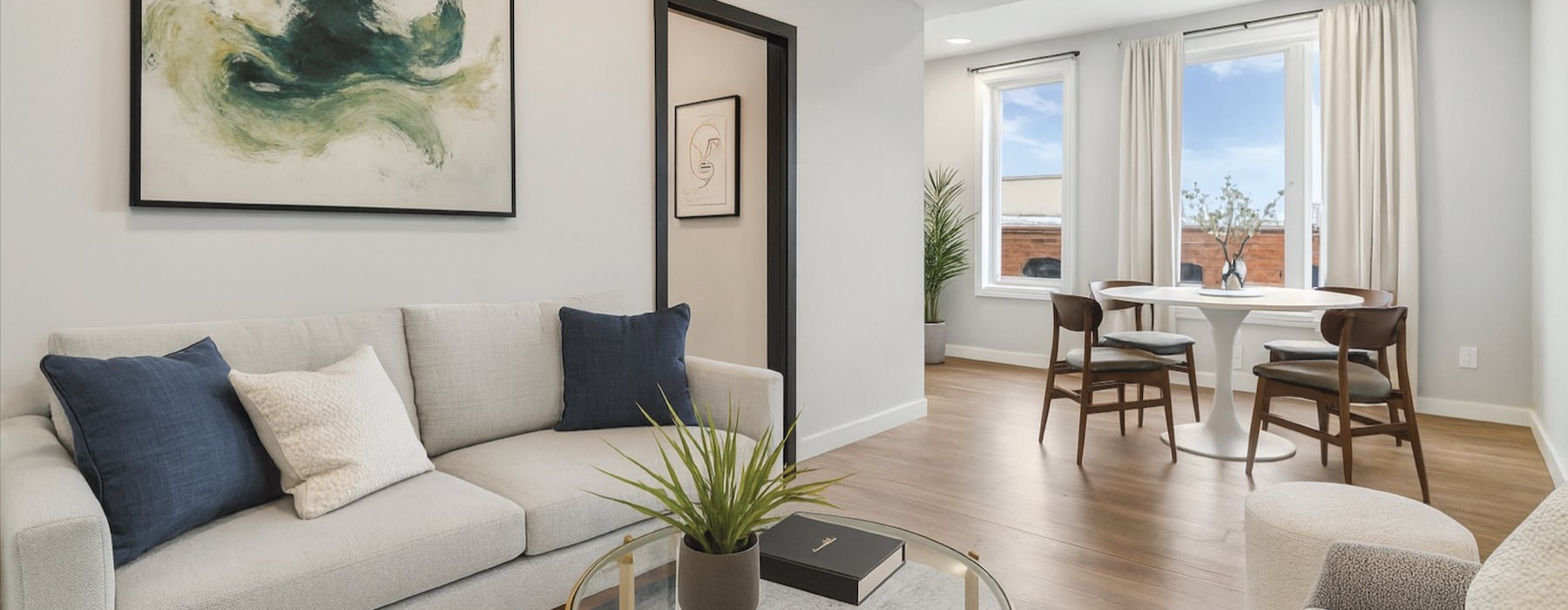 a living room with a couch and a table
